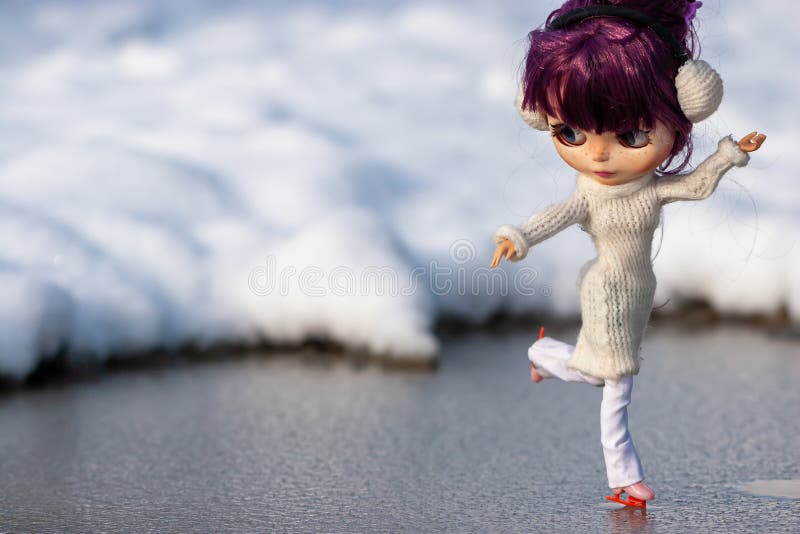 Beautiful, doll blythe, skates on ice, purple hair and winter clothes. 2