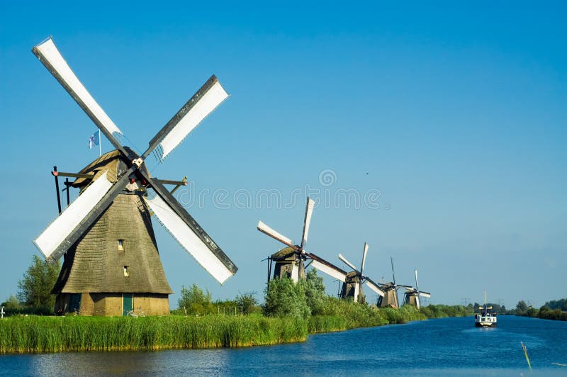 Beautiful dutch windmill lands royalty free stock images