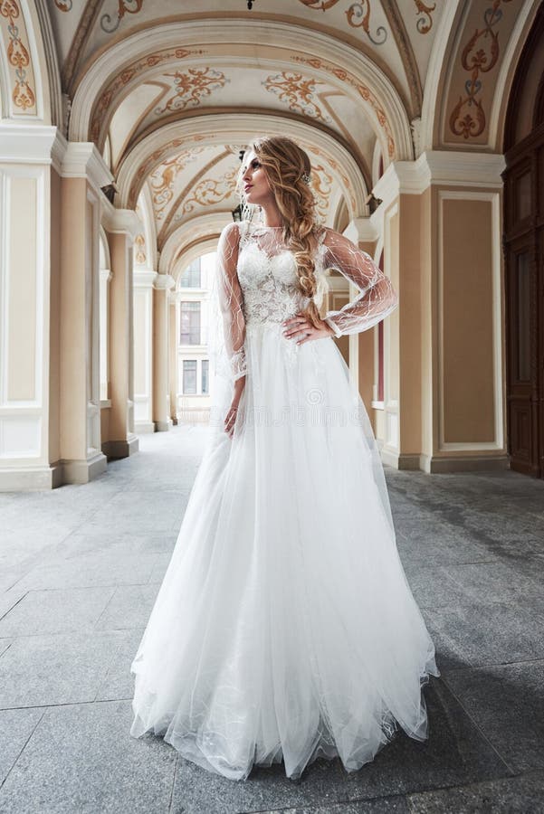 Premium Photo | Elegant young beautiful stylish bride in wedding dress long  gown