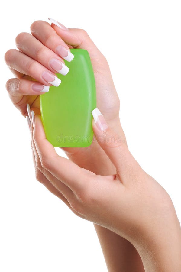 Beautiful elegant woman hands hold the soap