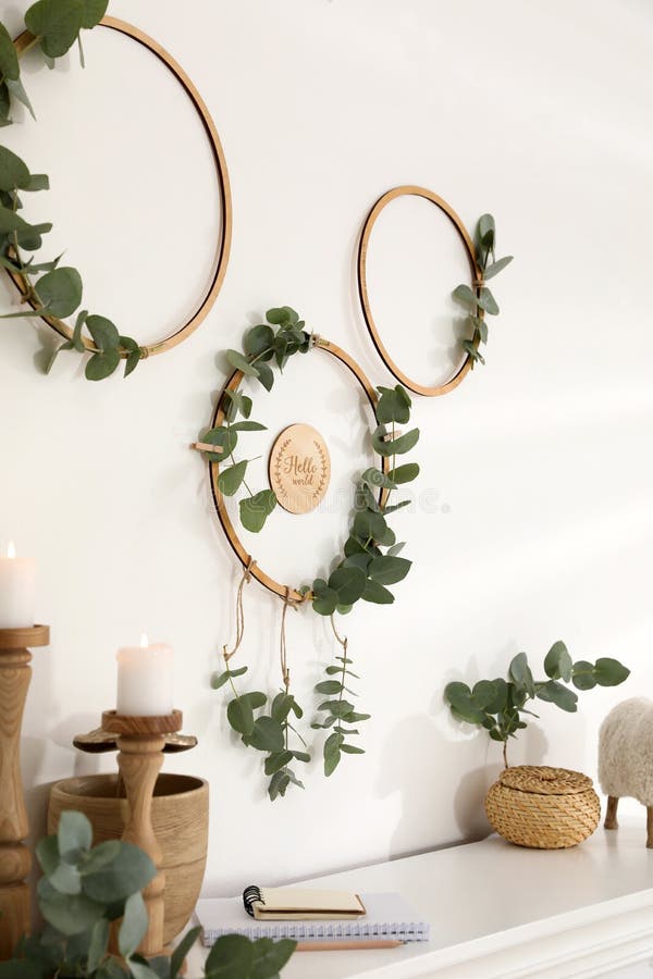 Beautiful Eucalyptus Decor on White Wall in Room. Interior Element