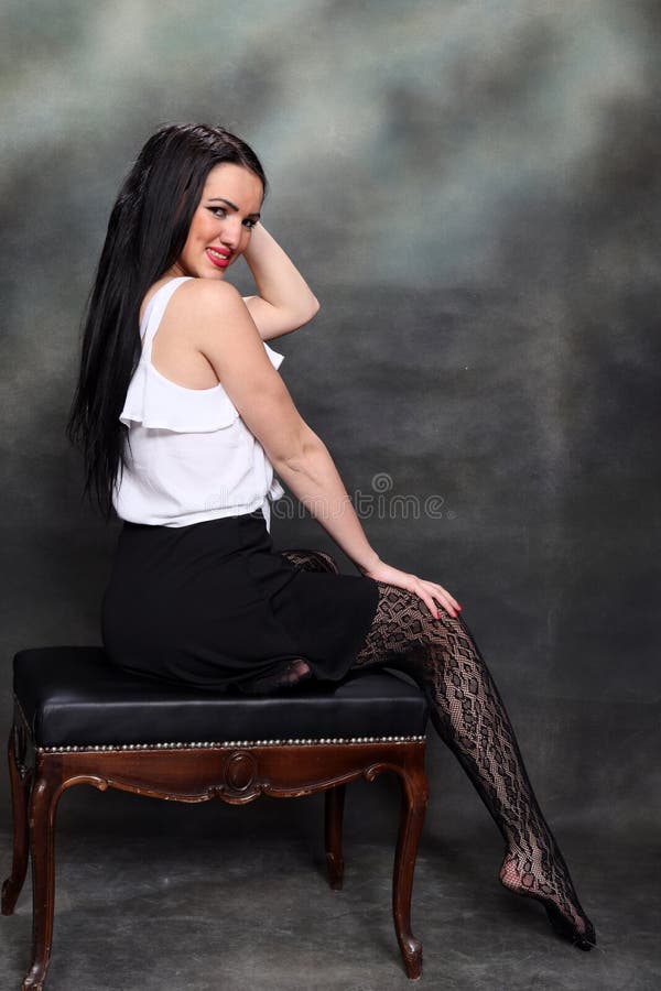 https://thumbs.dreamstime.com/b/beautiful-european-girl-long-black-hair-posing-studio-canvas-background-style-trends-fashion-concept-182759555.jpg