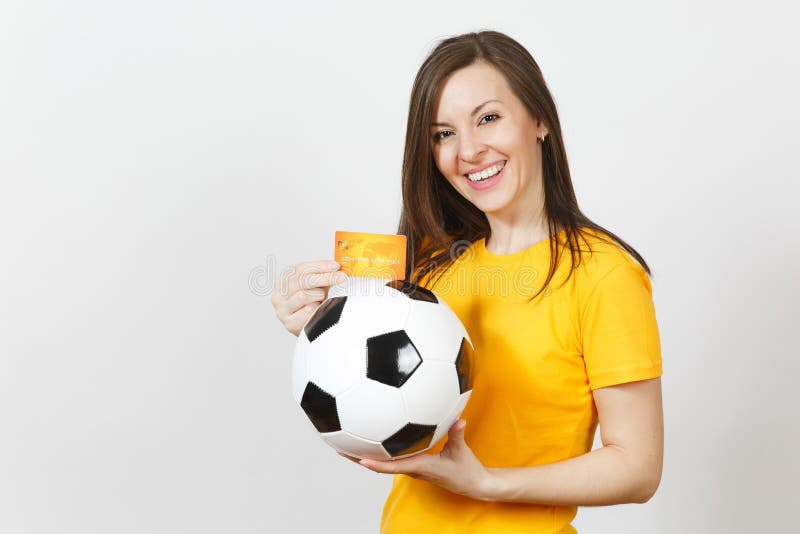 Beautiful European young people, football fan or player on white background. Sport, play, health, healthy lifestyle concept. Girl, gambling.