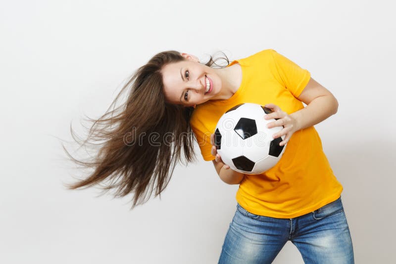 Beautiful European young people, football fan or player on white background. Sport, play, health, healthy lifestyle concept. Follower, admirer.