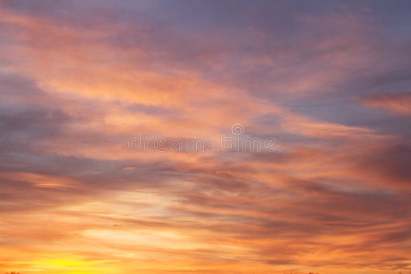 Beautiful fabulous winter orange-blue sunset outside the city.