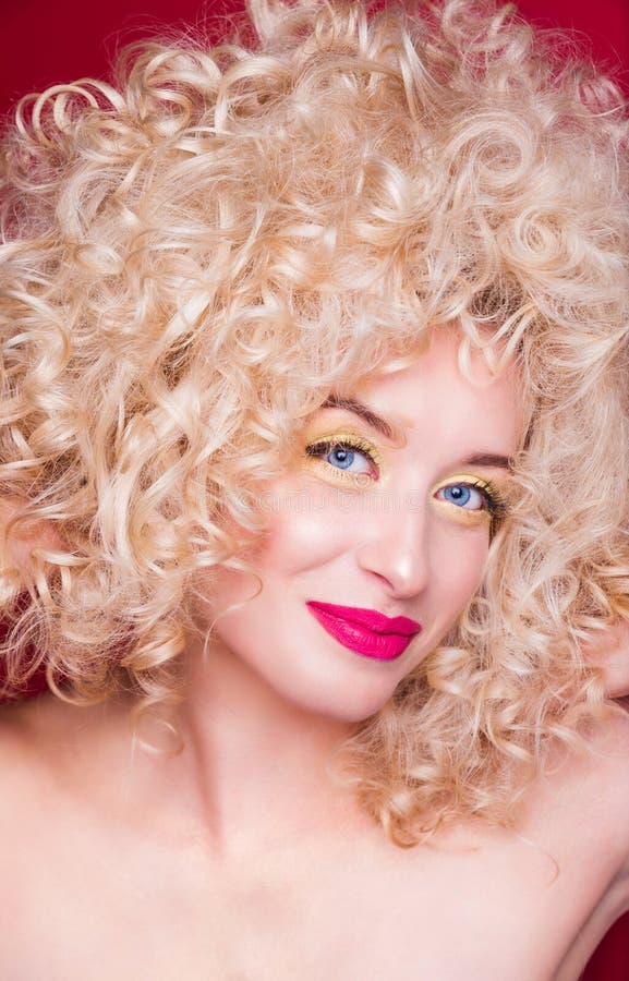 Beautiful Fashionable Blonde Girl In Retro Style With Voluminous Curly Hairstyle Open Shoulders