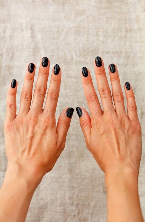 Manicure Design Of A Handsome Black French Man With Glitter On A Beige  Background In Blur Stock Photo - Image Of Glamour, Beauty: 182880296