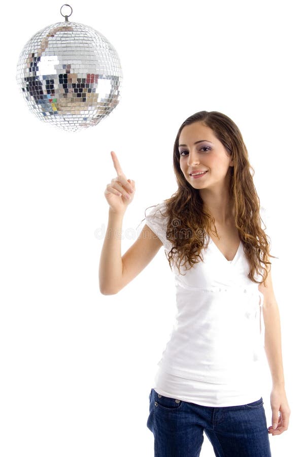 Beautiful female pointing at mirror ball