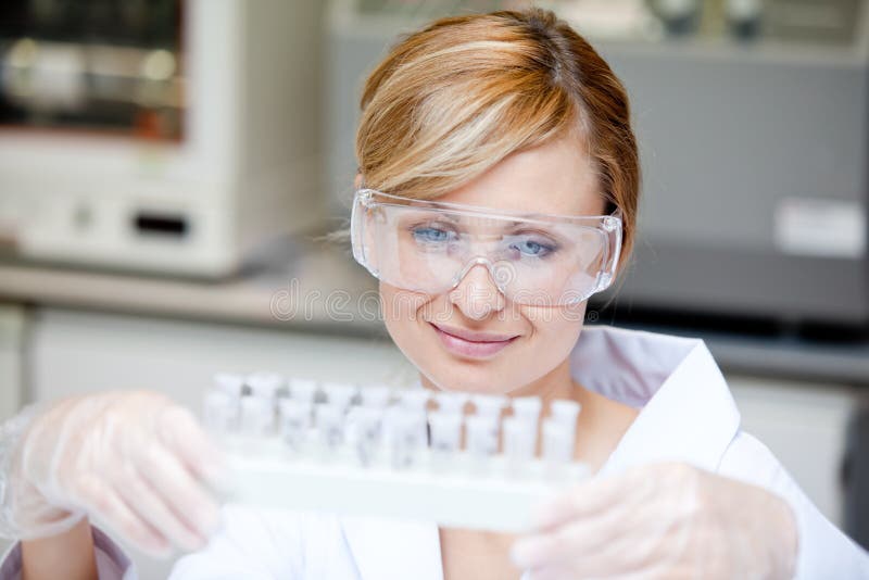 Beautiful Female Scientist Holding Samples Royalty Free Stock Photo
