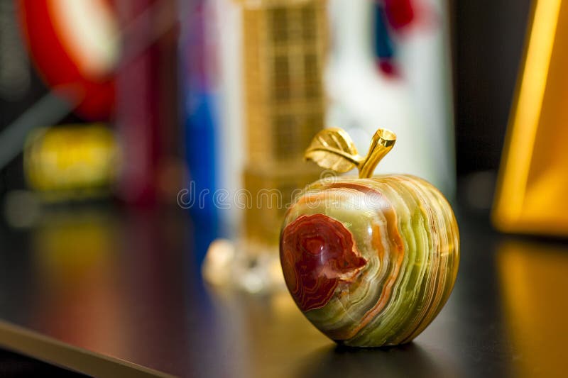Beautiful figurine in the form of an apple