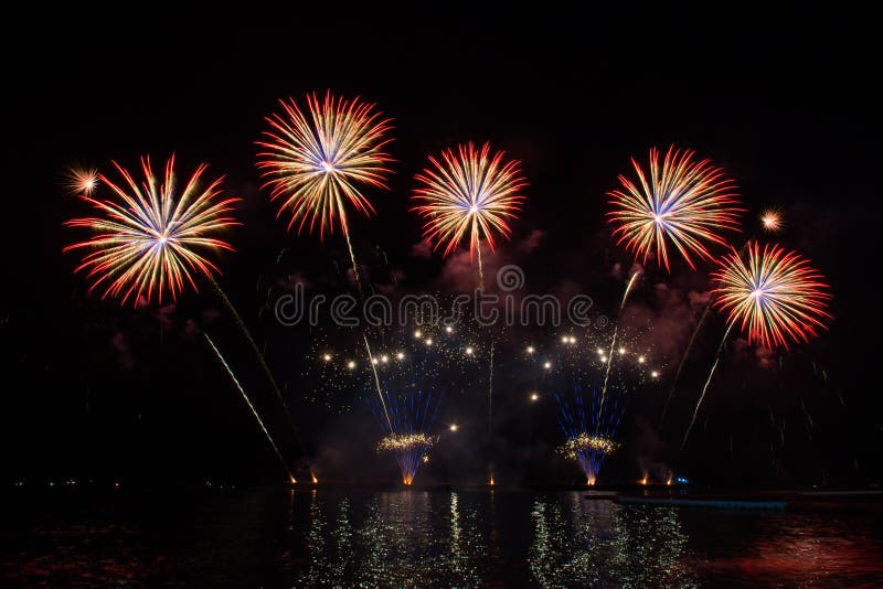 Firework display for celebration over the sea. Beautiful firework display for celebration over the sea stock photo Firework display for celebration over the sea. Beautiful firework display for celebration over the sea stock photo