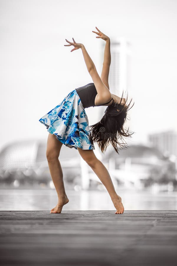 Beautiful Flexible Young Woman Dancing