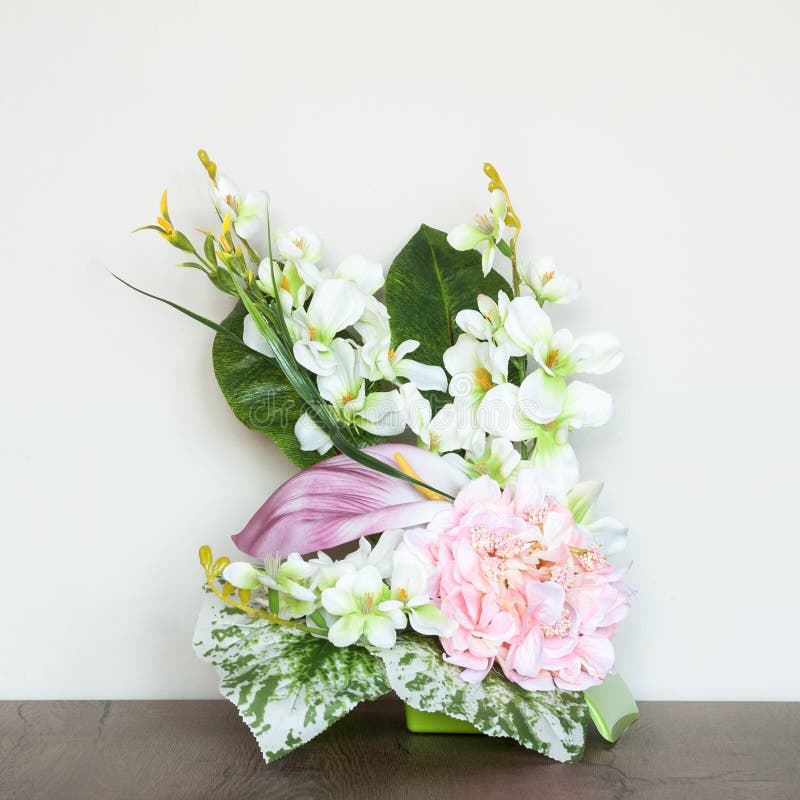 Beautiful Floral Composition with Artificial Flowers.