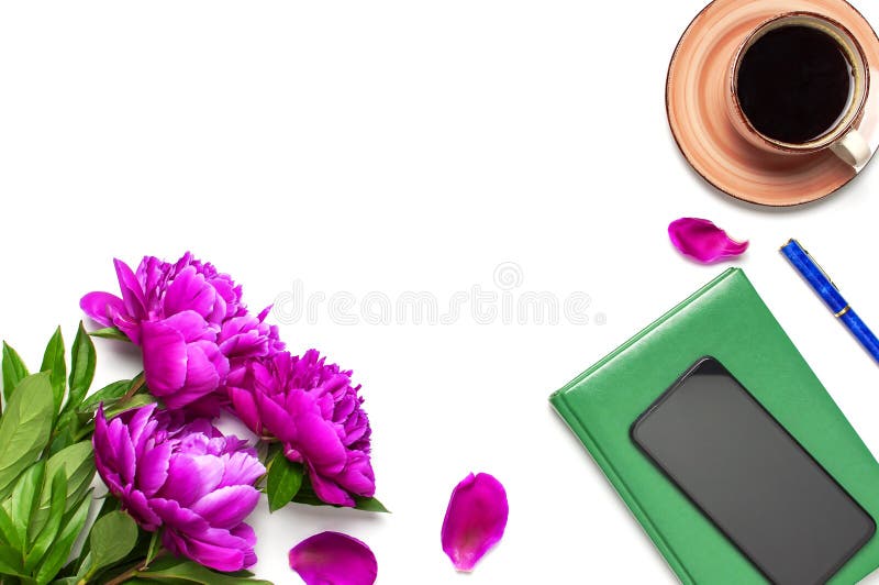 Beautiful flowers peonies, cup of coffee, green notebook, phone, pen on a white background top view with copy space. Female