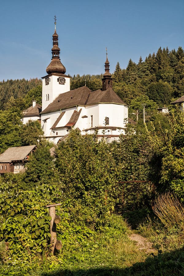 Beautiful fortified church in Spania Dolina, Slovakia, photo filter