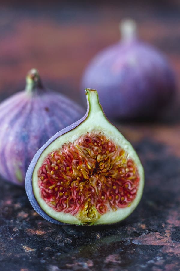 Beautiful and Fresh Figs on Rusty Surface. Half of Fig. Stock Image