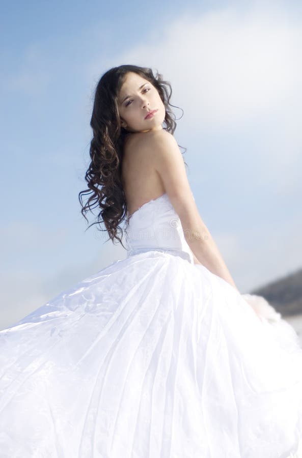 The beautiful gentle girl in white dress