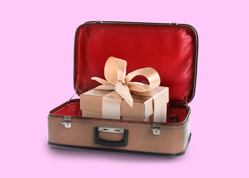 Beautiful Gift Box in Retro Suitcase on Pink Background Stock Photo