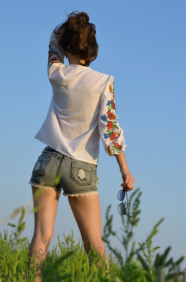 Beautiful girl against the sky. royalty free stock photo Beautiful girl against the sky. royalty free stock photo