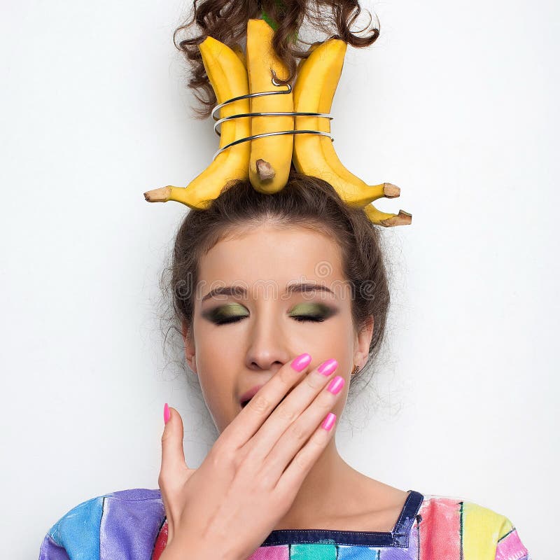 Beautiful girl and bananas