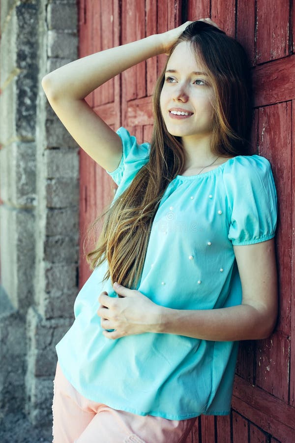 Girl In Blue T-shirt And Pink Pants Stock Image - Image of clothing, beauty: 117631669