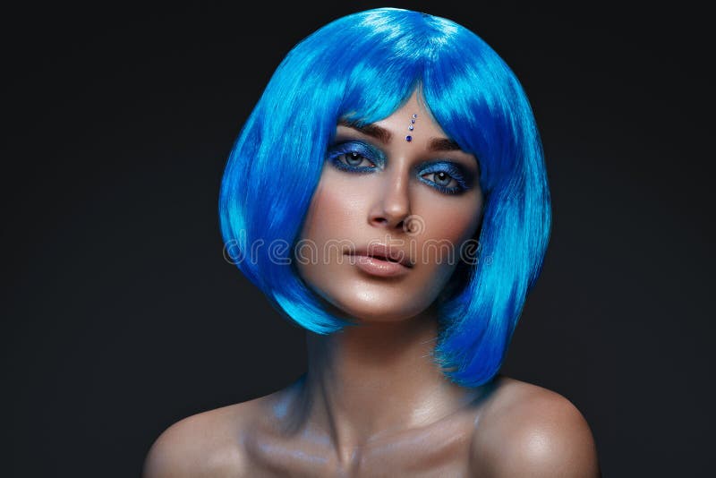 Beautiful girl in blue wig stock photos Beautiful girl in blue wig stock photos