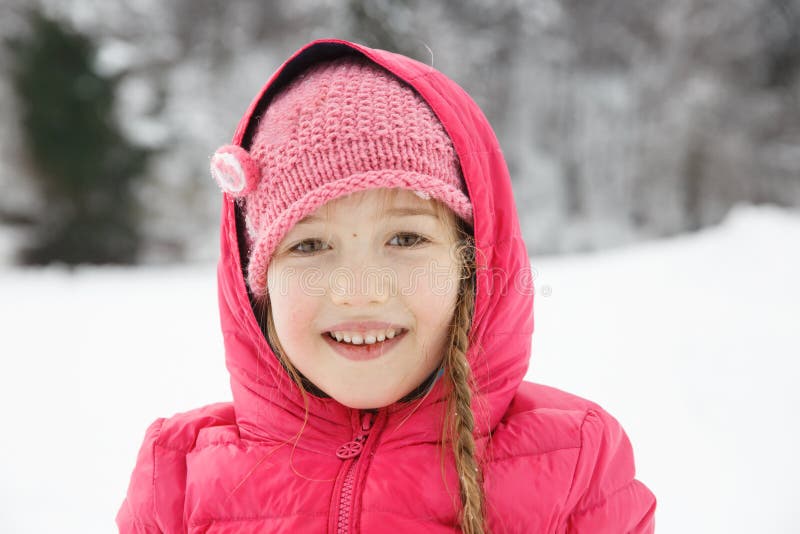 Beautiful Girl with Braids, Enjoying Winter and Snow Stock Photo ...