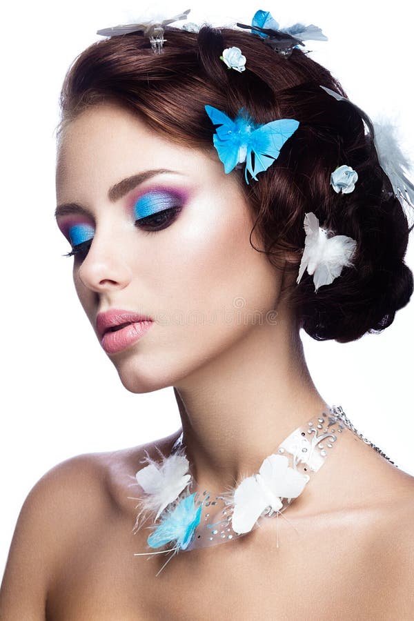 Beautiful Girl With Bright Blue Makeup And Butterflies In ...