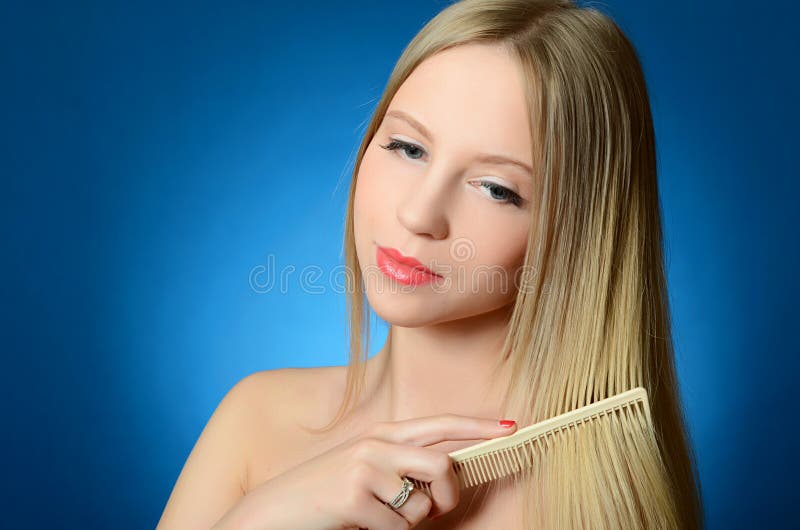The Beautiful Girl Brushes Hair Stock Photo Image of calm, alone