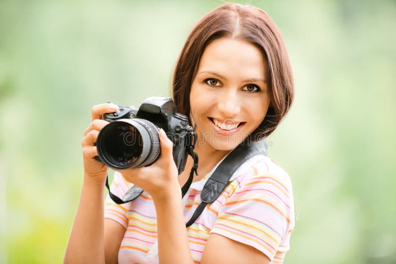 Beautiful girl with camera stock image. Image of outdoors 15789401