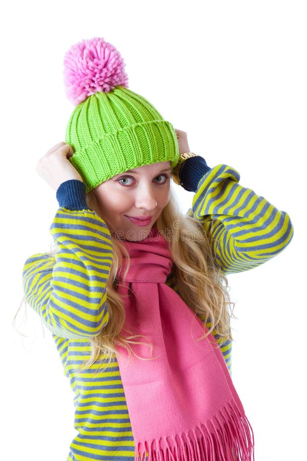 Beautiful girl in cap and scarf