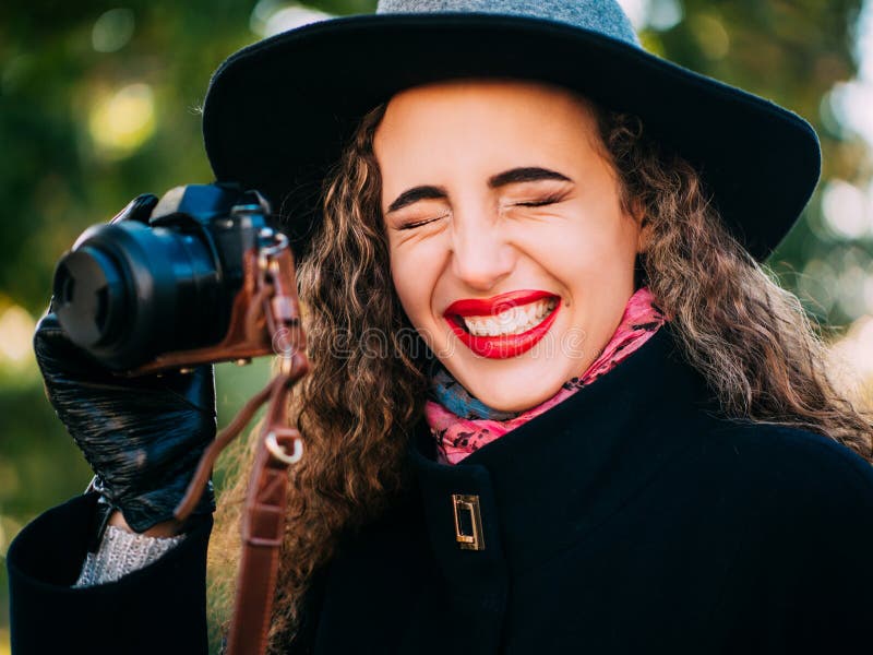 Beautiful girl in a coat stock photo. Image of hipster 128911062