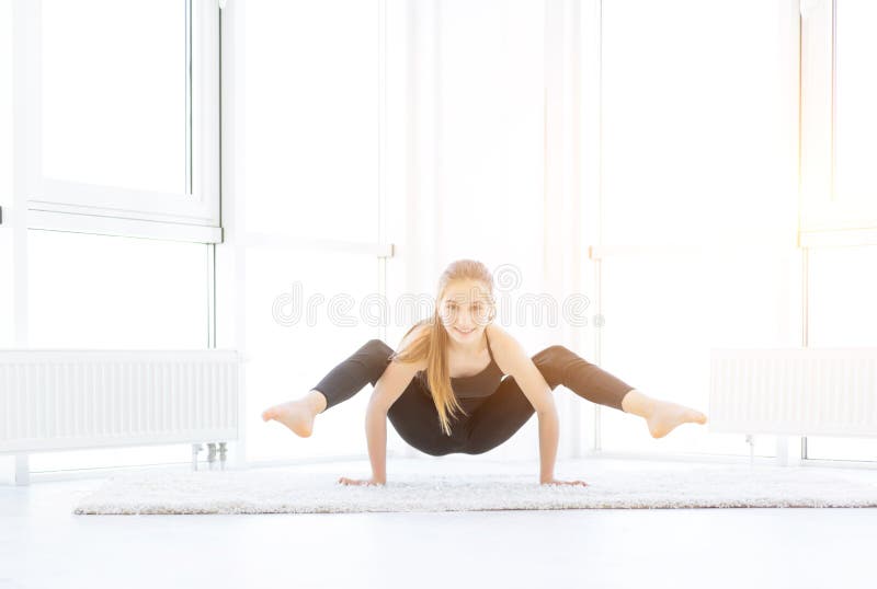 Beautiful girl doing yoga asana