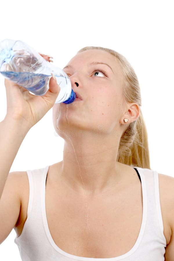 Beautiful girl drinks mineral water royalty free stock images 