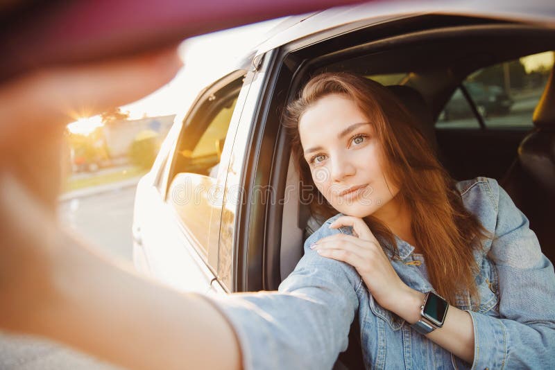 Beautiful Girl Driver Makes Selfie Photo Wheel of Car. Concept Travel ...