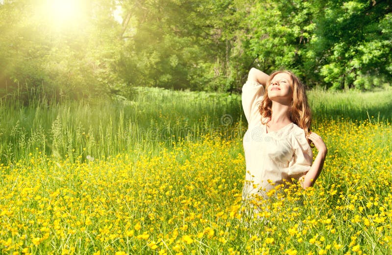 Beautiful girl enjoying the summer sun