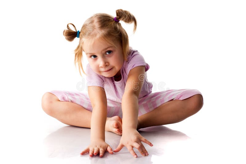 Beautiful girl exercising, butterfly pose