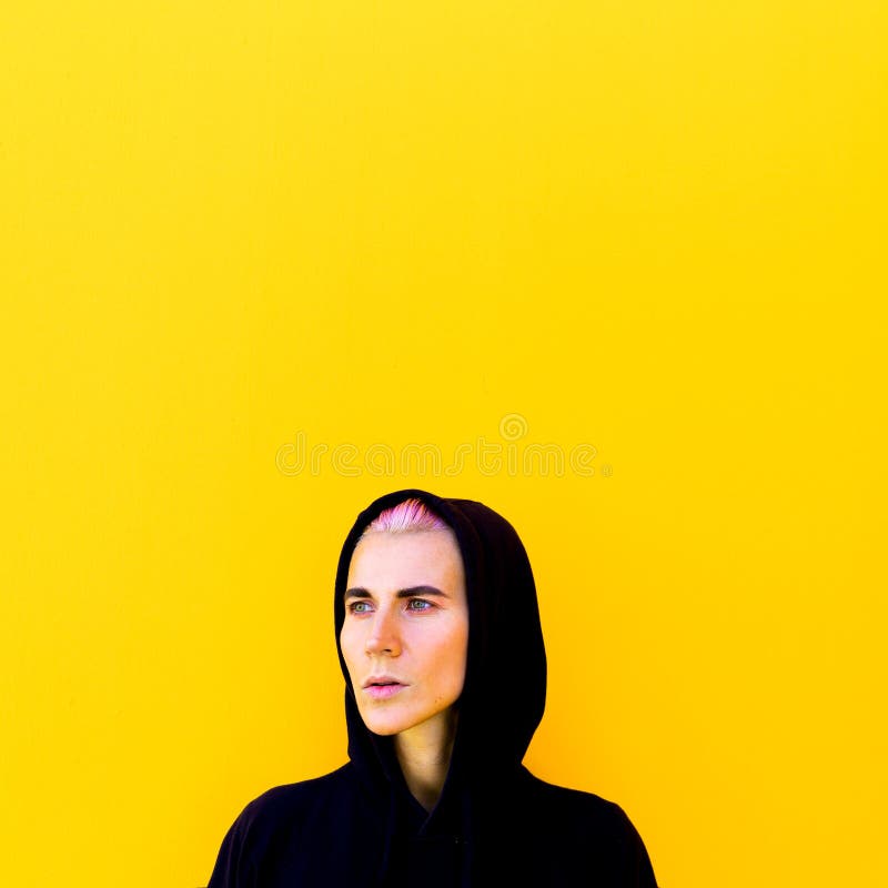 Girl in a Hoodie Yellow Mood Urban Wall Minimal Stock Photo - Image of ...