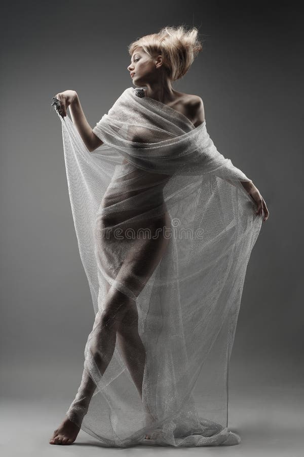 Beautiful girl in fishnet dancing stock images Beautiful girl in fishnet dancing stock images