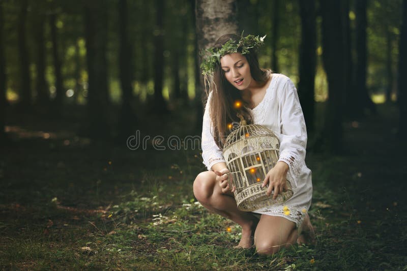 Beautiful girl and forest fairies