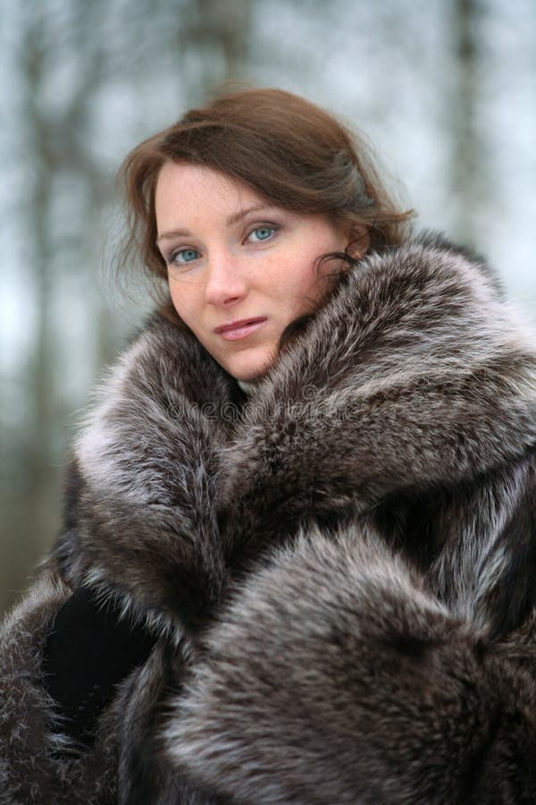 Beautiful Girl in a Fur Coat Stock Photo - Image of glamour, beautiful ...