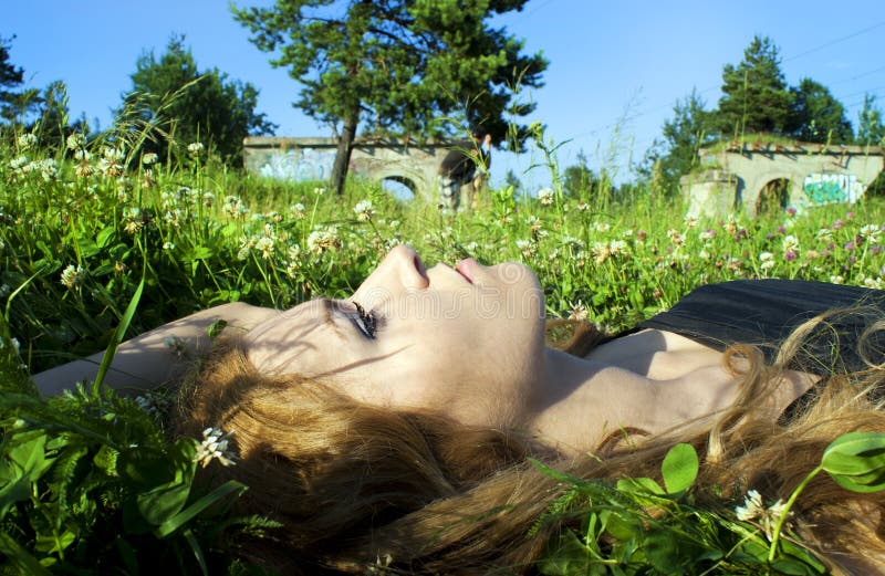 Beautiful girl in the grass