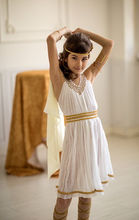Beautiful Girl in Greek Dress Stock Image - Image of greece, hairstyle:  143447957