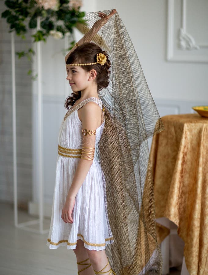Beautiful girl in Greek dress stock image Beautiful girl in Greek dress stock image