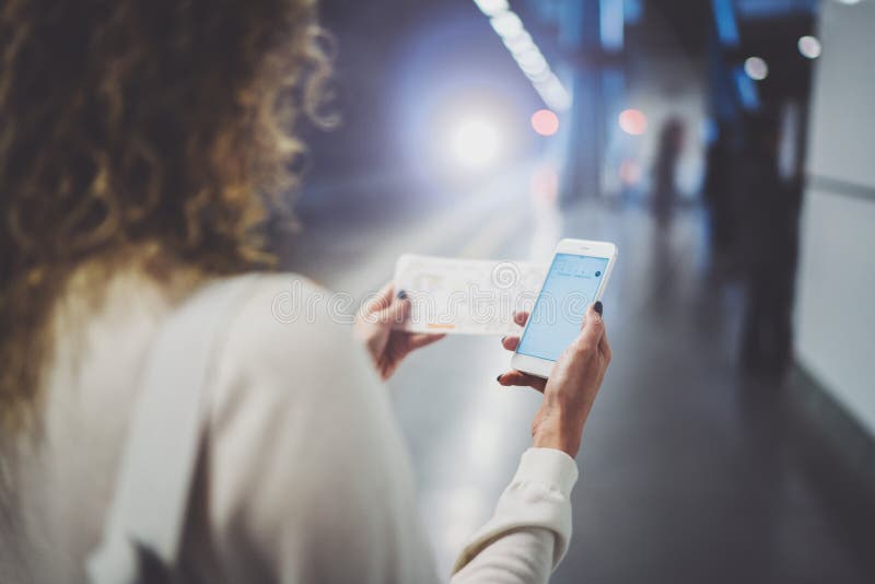 Beautiful girl happy using mobile phone app for conversation in holiday travel.Attractive woman on transit platform stock images Beautiful girl happy using mobile phone app for conversation in holiday travel.Attractive woman on transit platform stock images