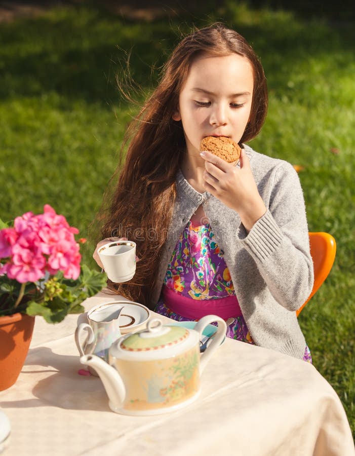 Beautiful Girl Having Breakfast Yard Biting Cookie Stock Photos Free