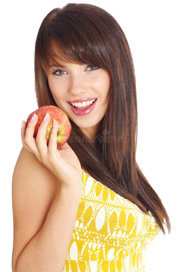 Beautiful girl holding apple