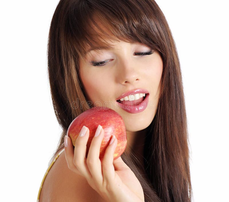 Beautiful girl holding apple