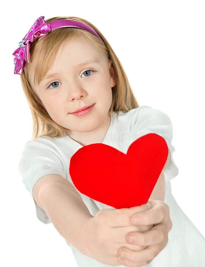 Beautiful girl holding a red heart