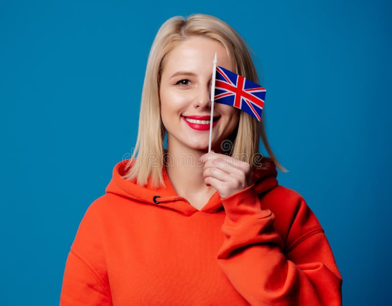 Beautiful Girl Holds British Flag in Hand Stock Photo - Image of hair, british: 169077156